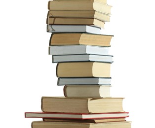 Photo of Stack of many different books isolated on white