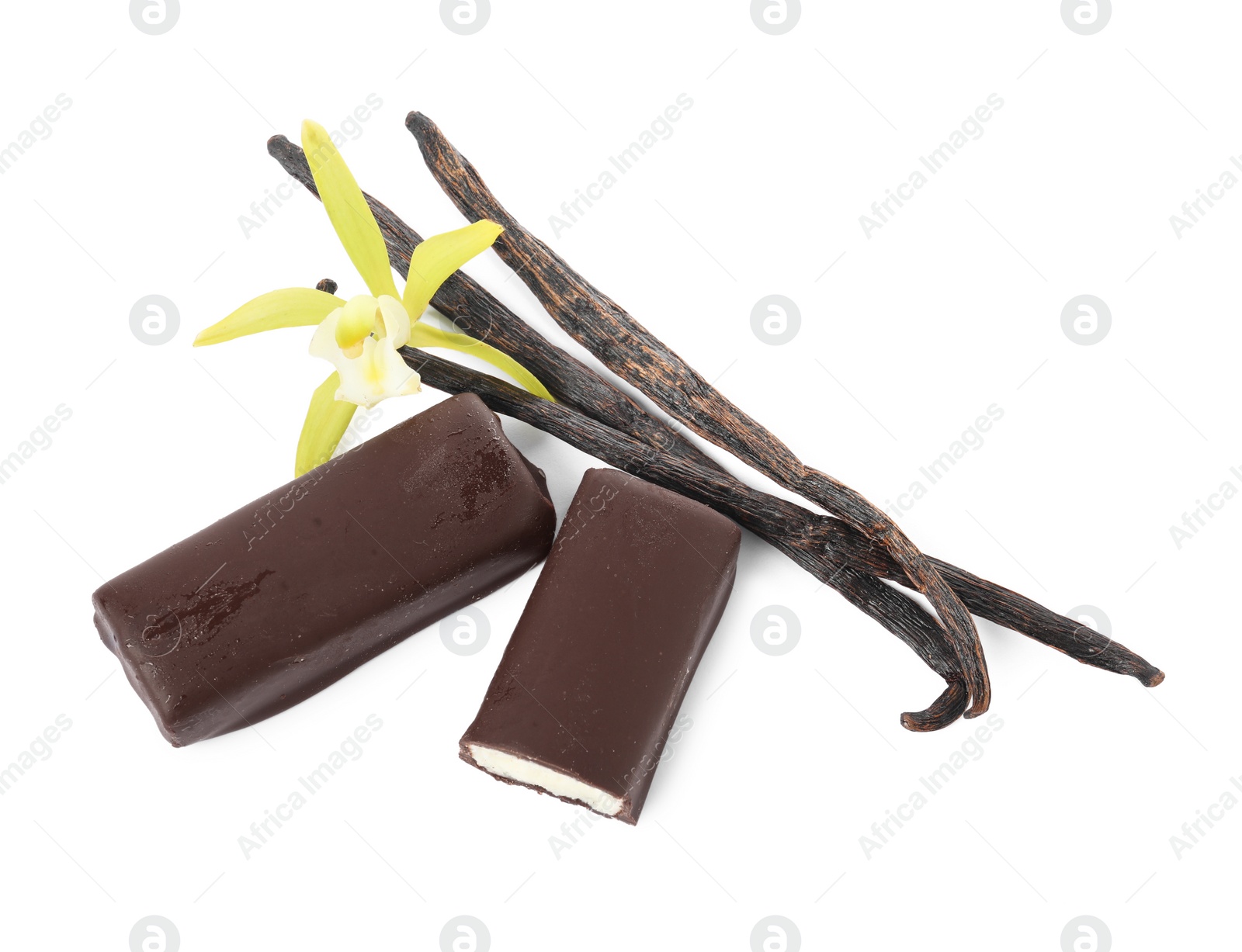 Photo of Glazed curd cheese bars, vanilla pods and flower isolated on white, top view