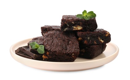 Photo of Delicious chocolate brownies with nuts and fresh mint on white background