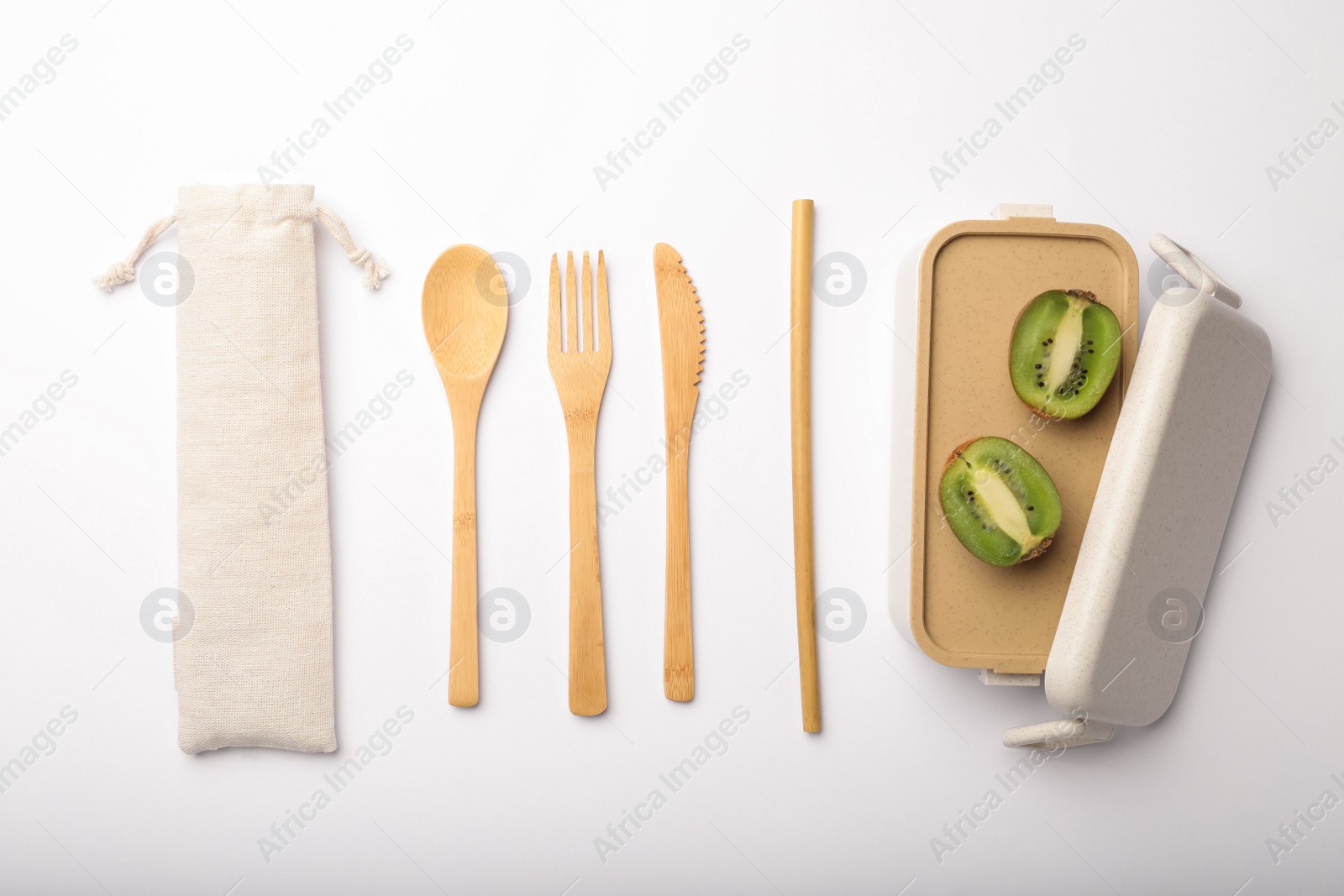 Photo of Flat lay composition with eco friendly products on white background