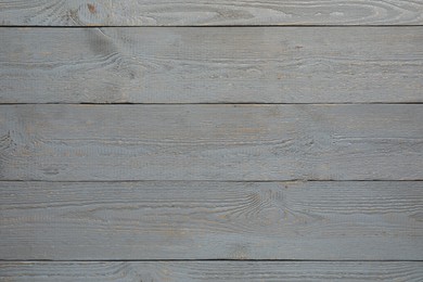 Texture of grey wooden surface as background, top view