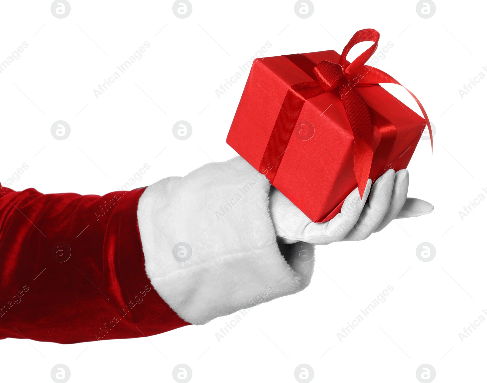 Photo of Merry Christmas. Santa Claus holding gift box on white background, closeup