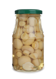 Photo of Glass jar with pickled mushrooms isolated on white