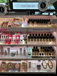 Photo of WARSAW, POLAND - JULY 17, 2022: Cosmetic products on display in Too Faced retail store