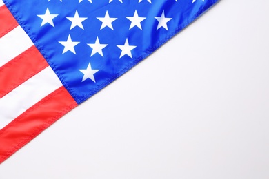 Photo of American flag on white background, closeup. National symbol