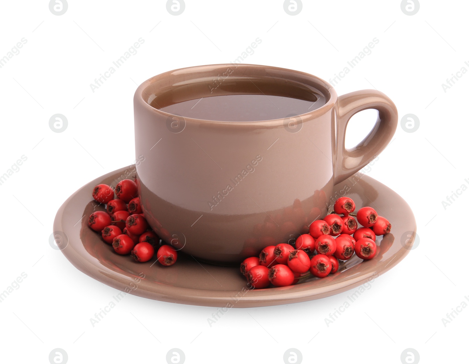 Photo of Aromatic hawthorn tea in cup and berries isolated on white