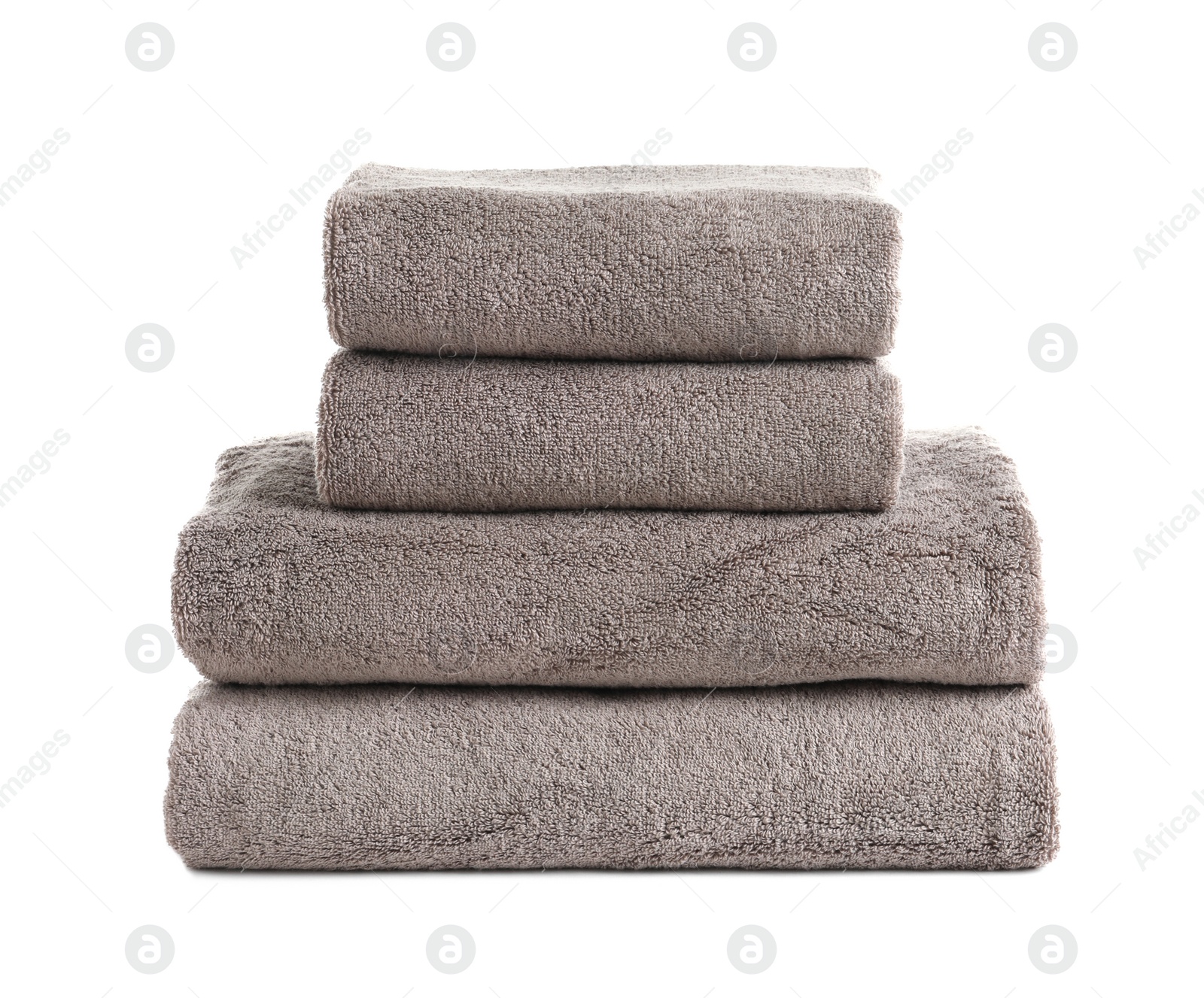 Photo of Stack of fresh towels isolated on white