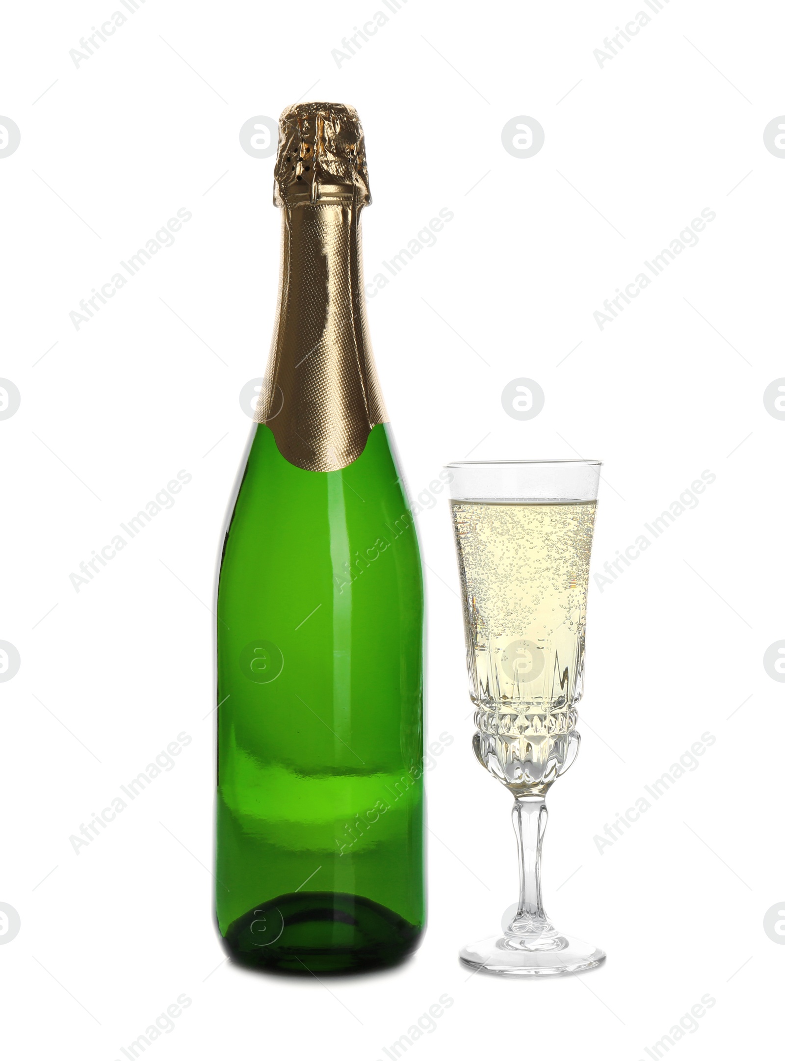 Photo of Bottle and glass with champagne on white background. Festive drink