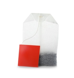 Unused tea bag with tag on white background. Space for text