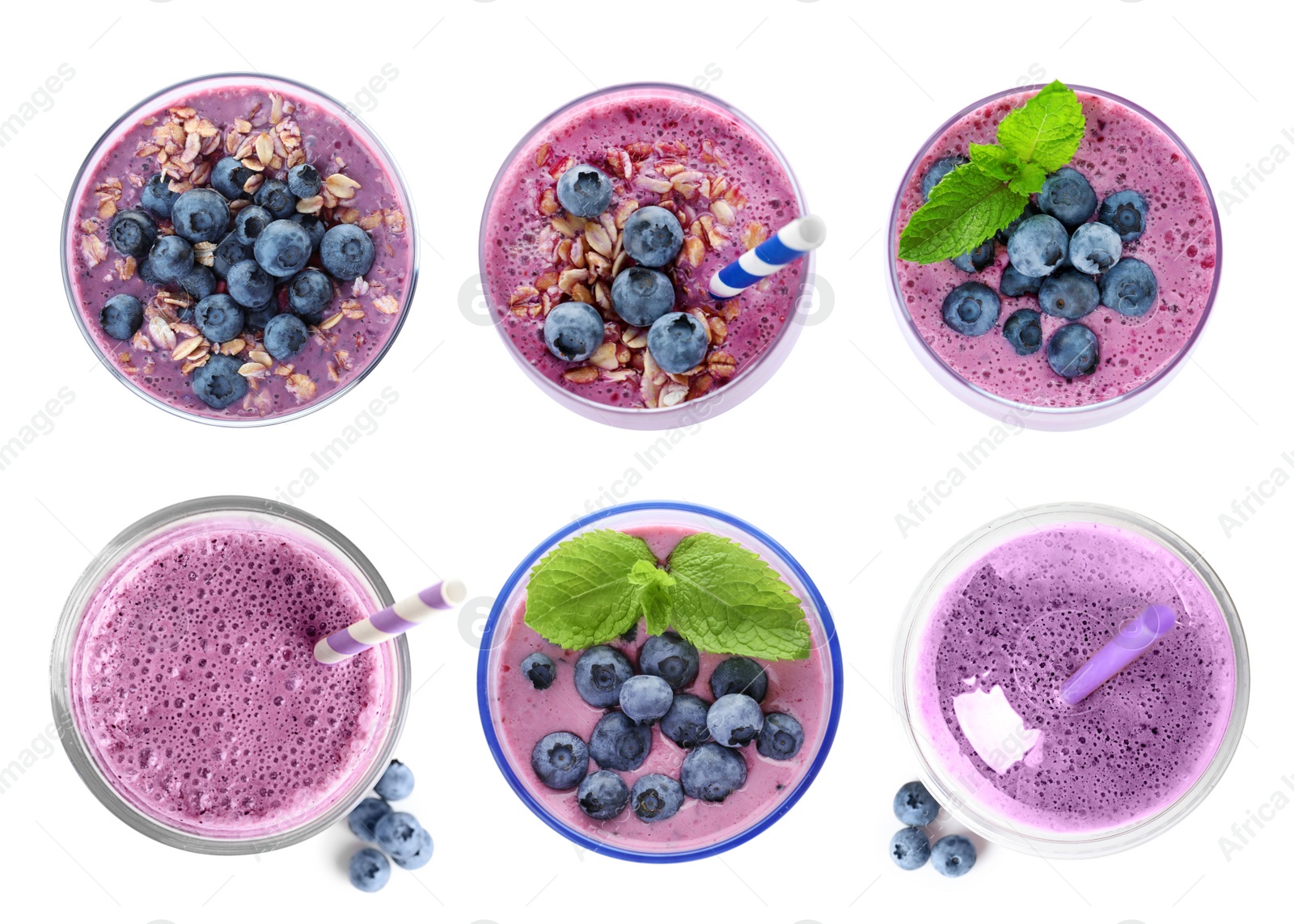 Image of Set with delicious blueberry smoothies on white background, top view