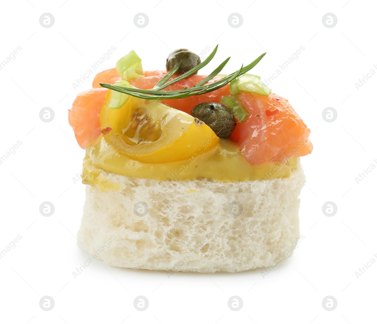 Photo of Tasty canape with salmon, tomatoes, capers and herbs isolated on white