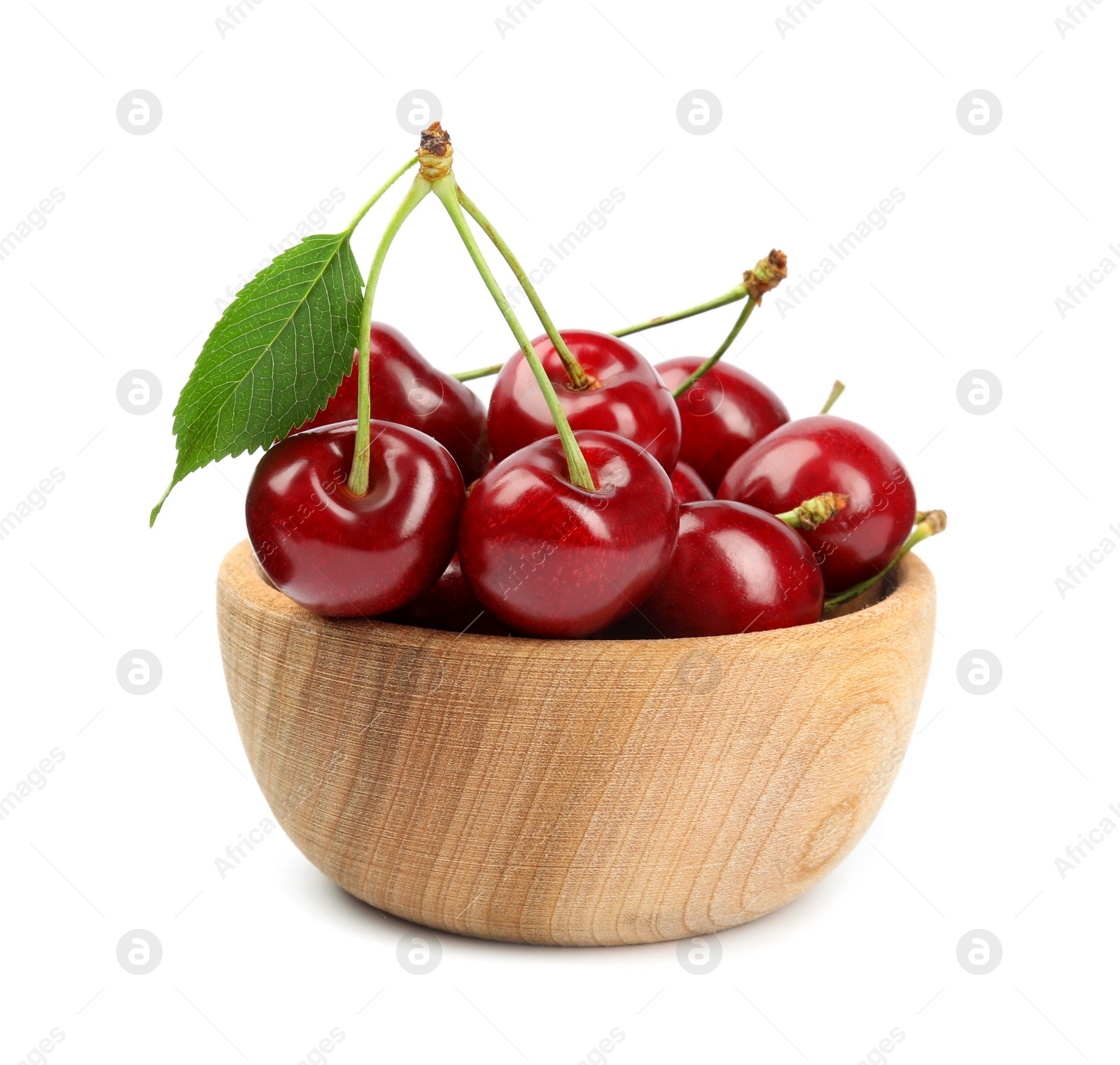 Photo of Wooden bowl with ripe sweet cherries on white background