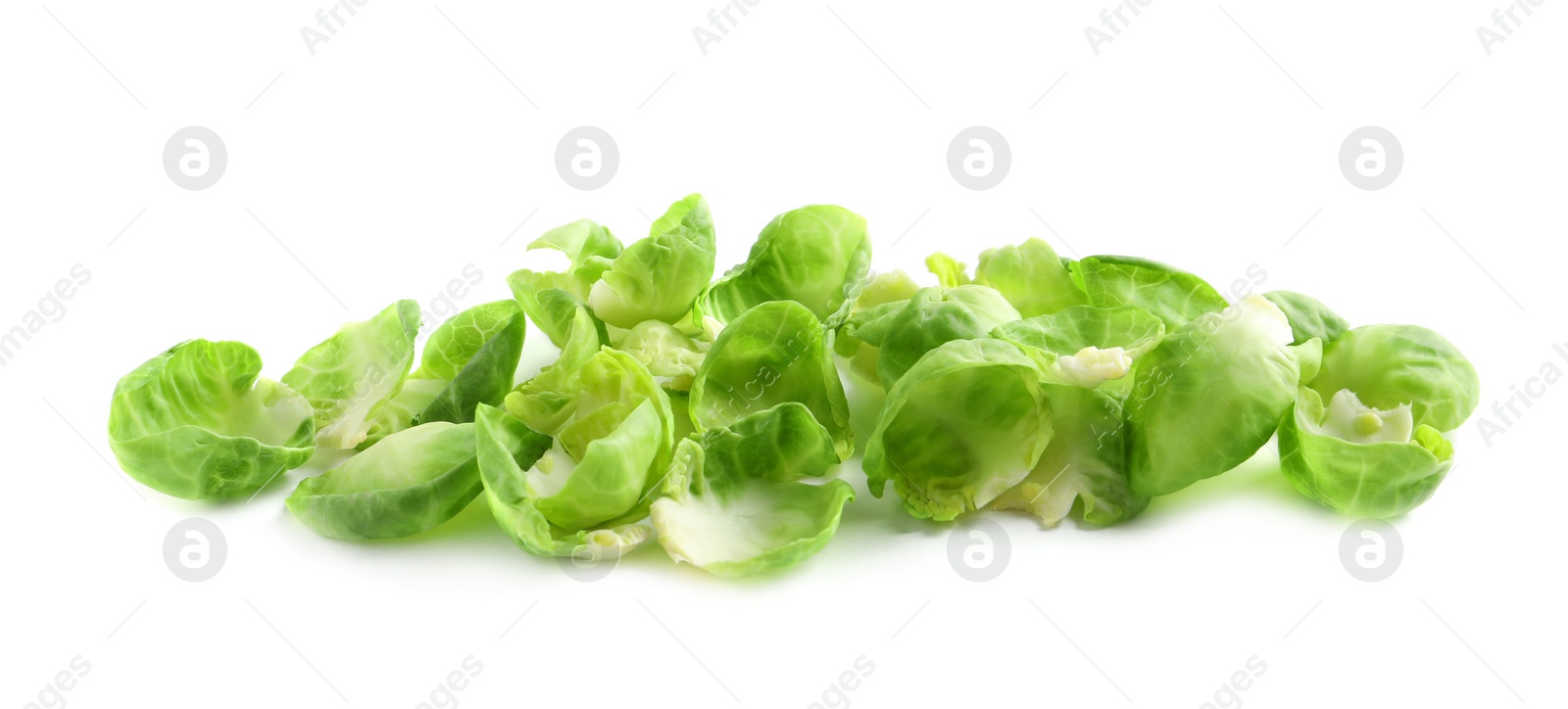 Photo of Leaves of fresh Brussels sprouts isolated on white