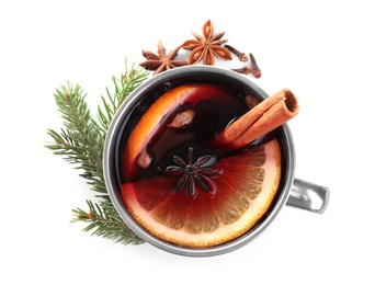 Mug of mulled wine and ingredients on white background, top view