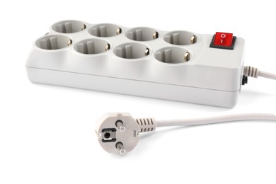 Photo of Power strip with extension cord on white background. Electrician's equipment