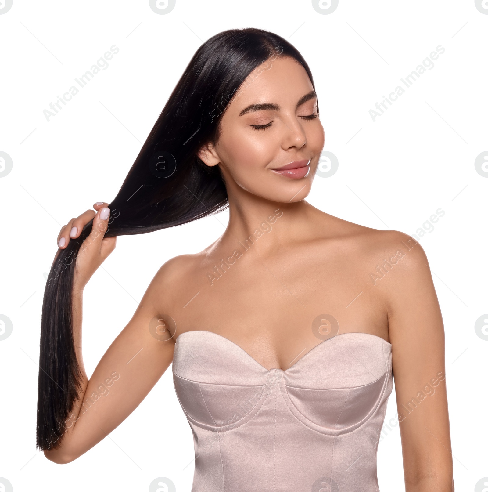 Photo of Portrait of beautiful young woman with healthy strong hair on white background