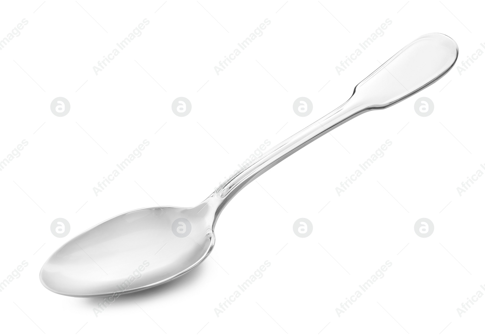 Photo of Clean shiny silver spoon isolated on white