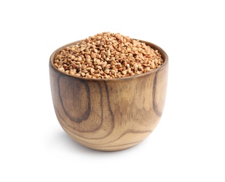 Bowl with uncooked buckwheat on white background