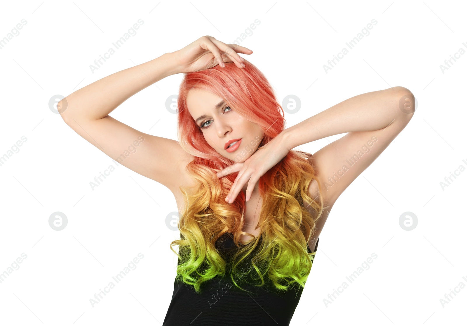 Image of Portrait of young woman with dyed long curly hair on white background