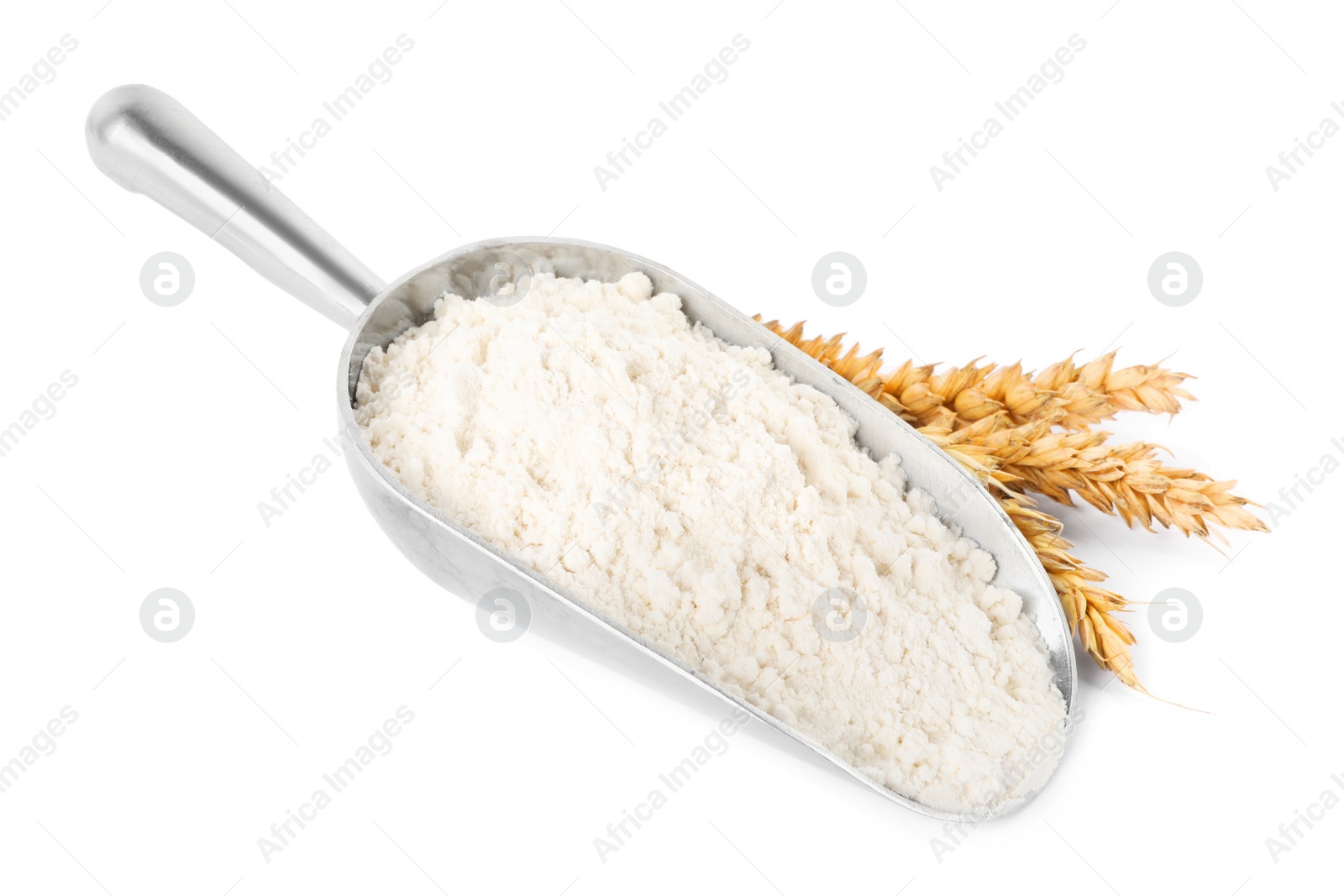 Photo of Scoop with wheat flour and spikes isolated on white