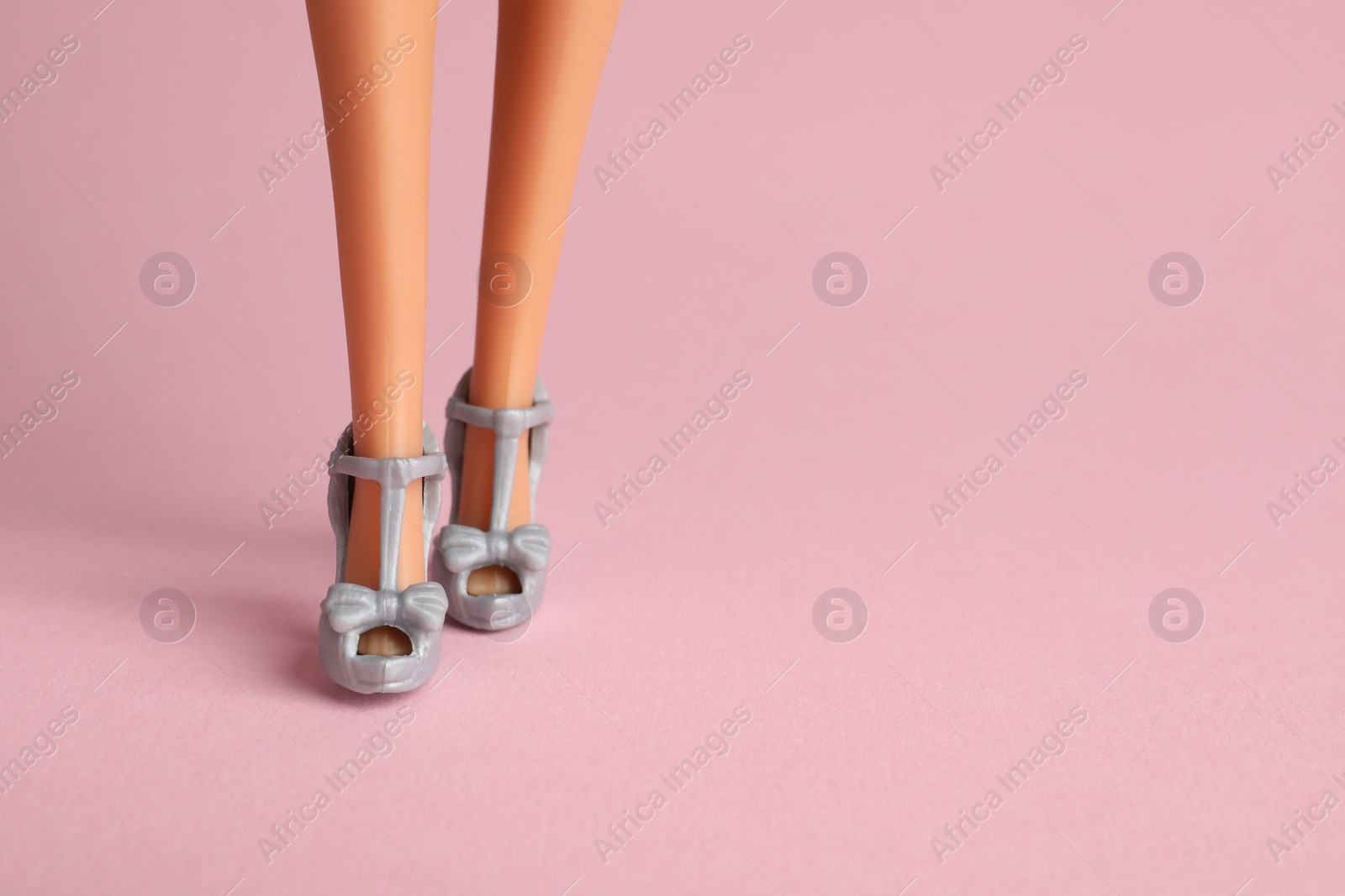 Photo of Mykolaiv, Ukraine - September 2, 2023 Barbie doll on pale pink background, closeup with space for text