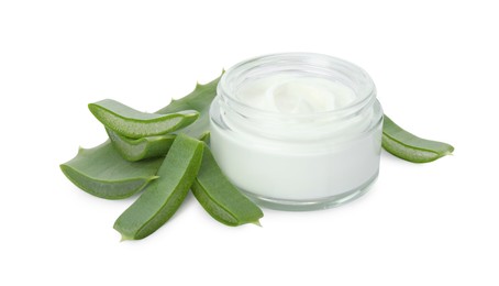 Jar of natural cream and cut aloe leaves isolated on white