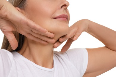 Mature woman touching her neck on white background, closeup