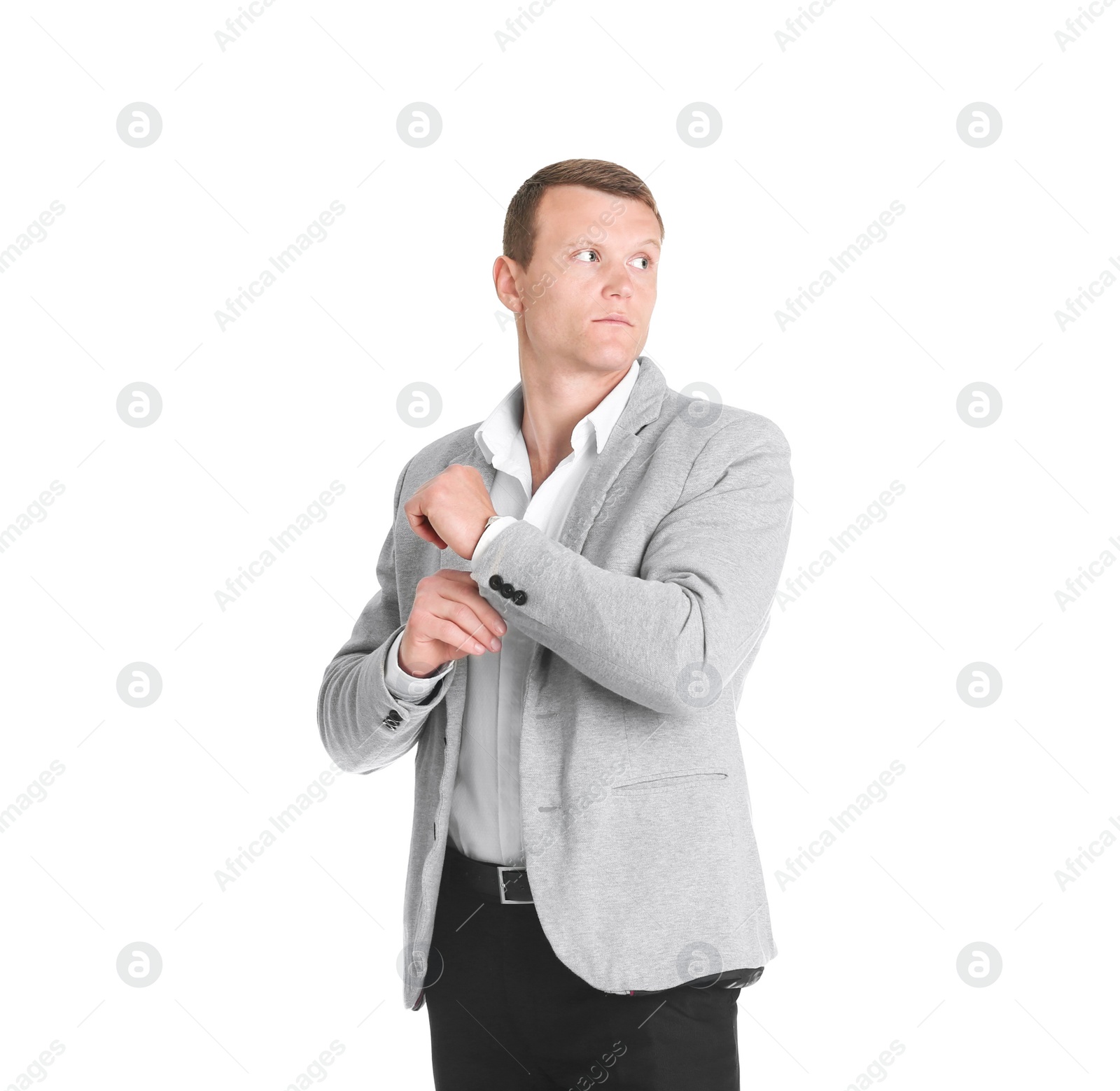 Photo of Handsome young man in suit on white background