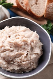 Photo of Delicious lard spread in bowl, closeup view