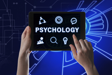 Image of Psychologist working with modern tablet on color background, closeup 