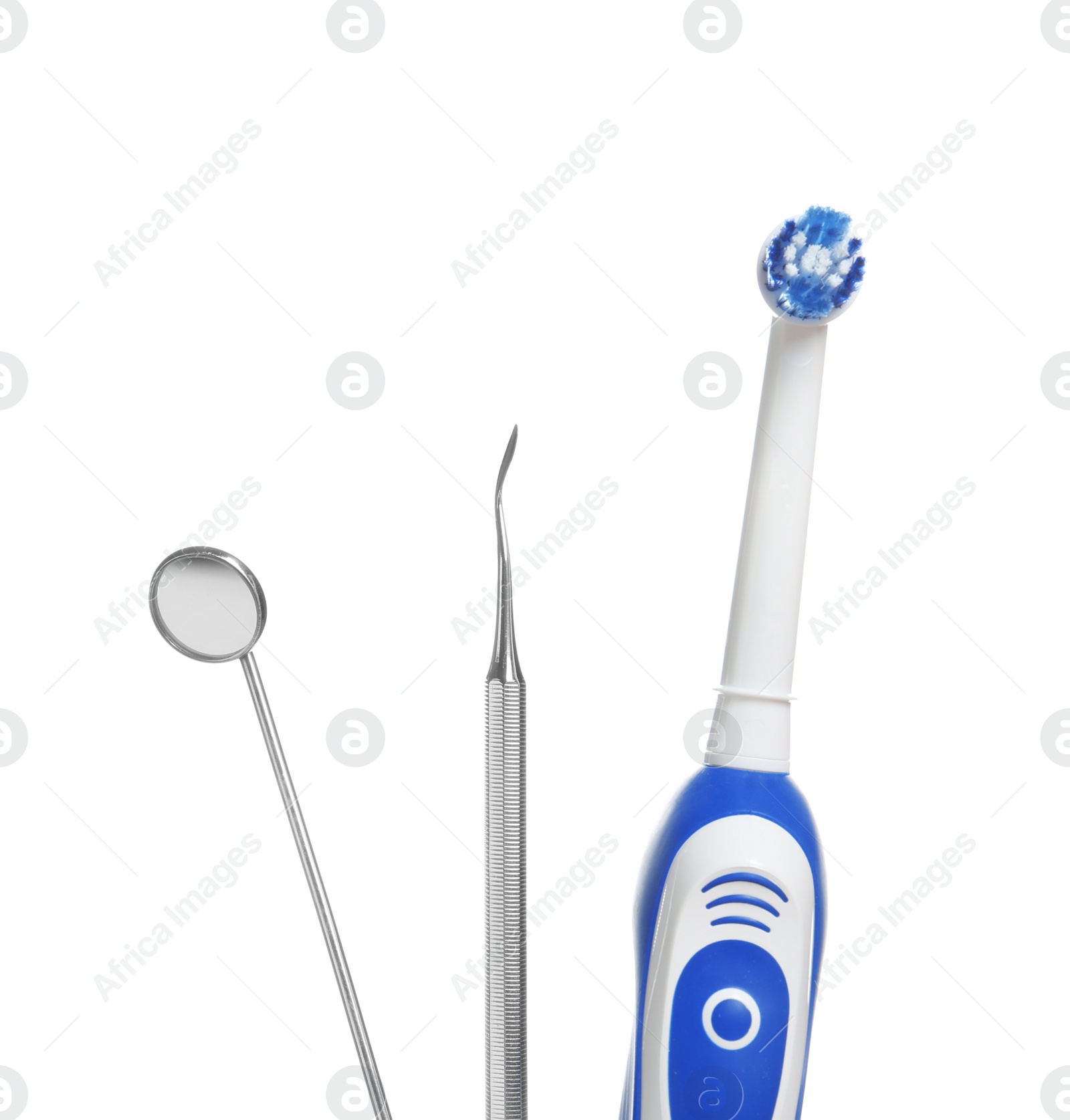 Photo of Professional dental tools and electric toothbrush isolated on white