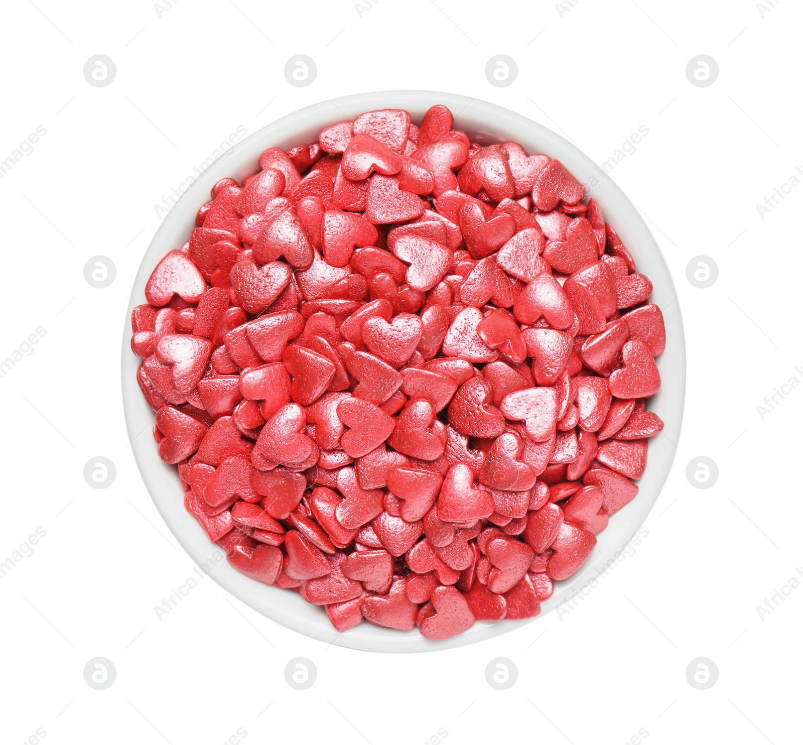 Photo of Sweet candy hearts in bowl on white background, top view