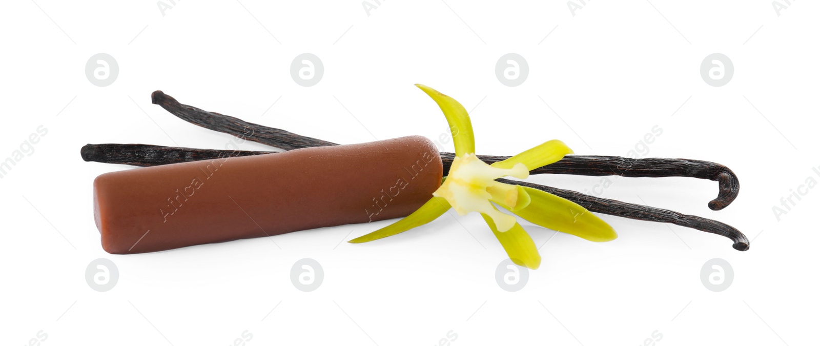 Photo of Glazed curd cheese bar, vanilla pods and flower isolated on white