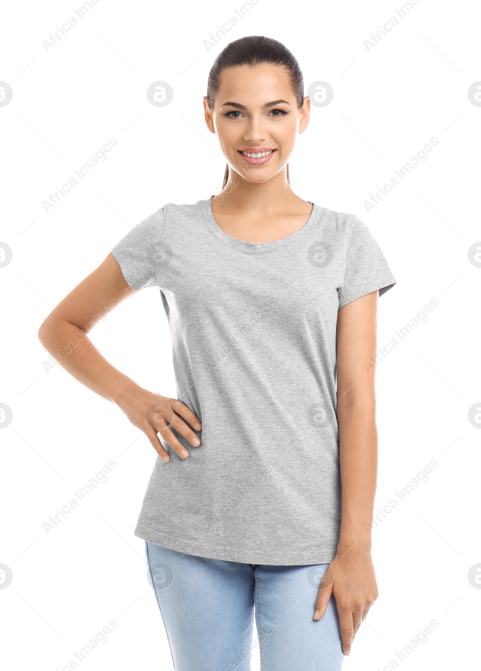 Photo of Young woman in t-shirt on white background. Mockup for design