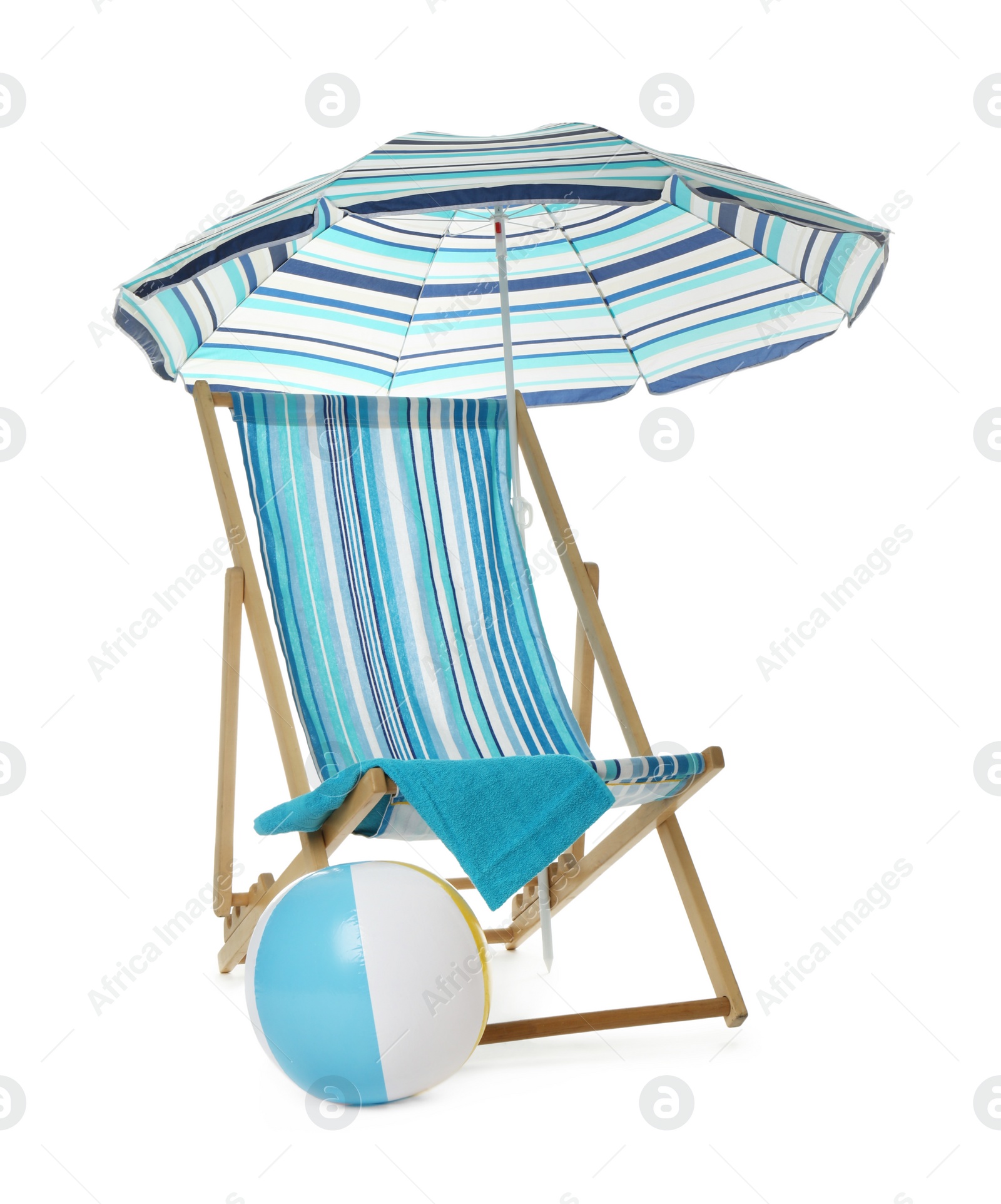 Photo of Open blue striped beach umbrella, deck chair, towel and inflatable ball on white background