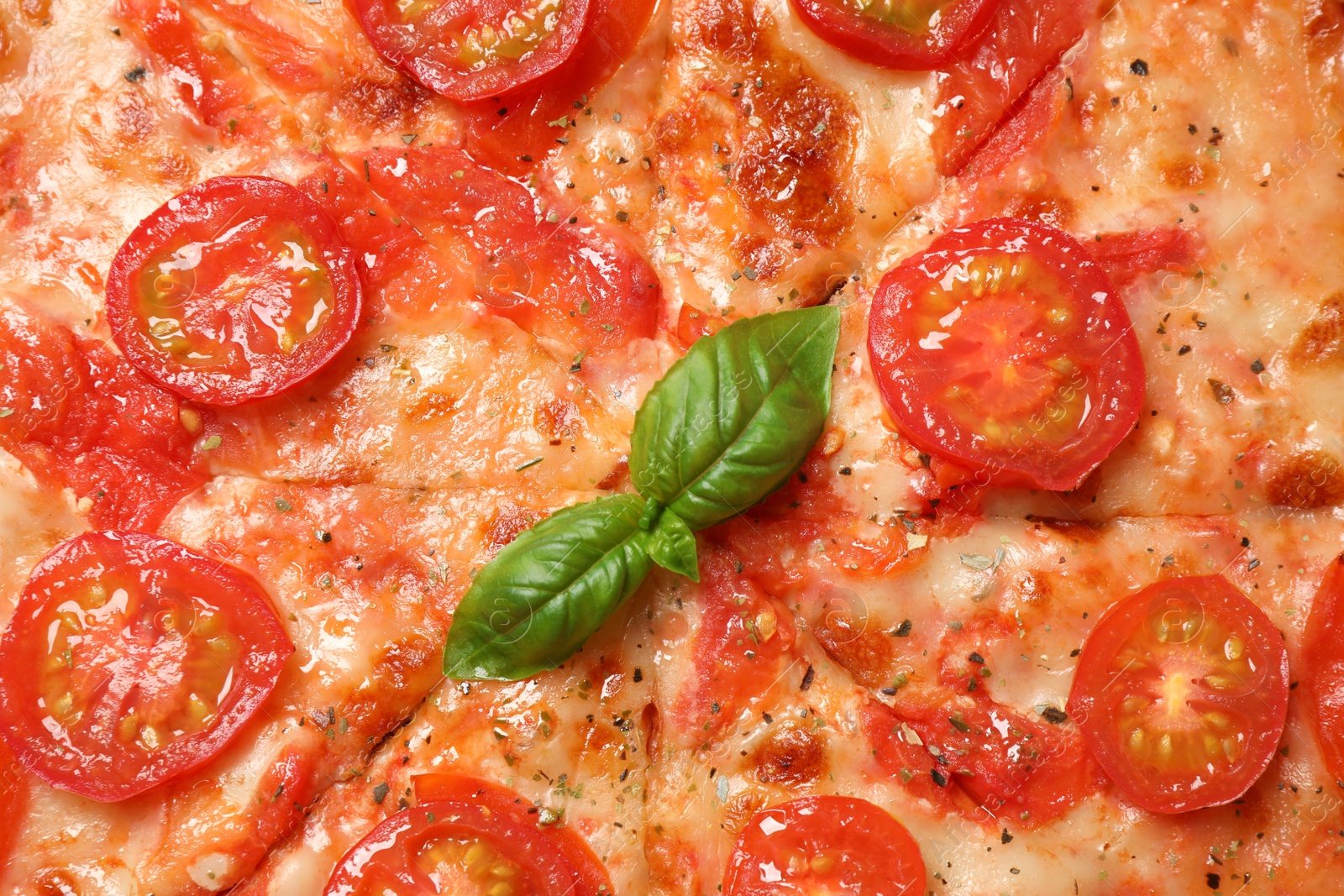 Photo of Delicious pizza Margherita as background, closeup view