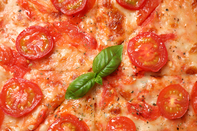 Delicious pizza Margherita as background, closeup view