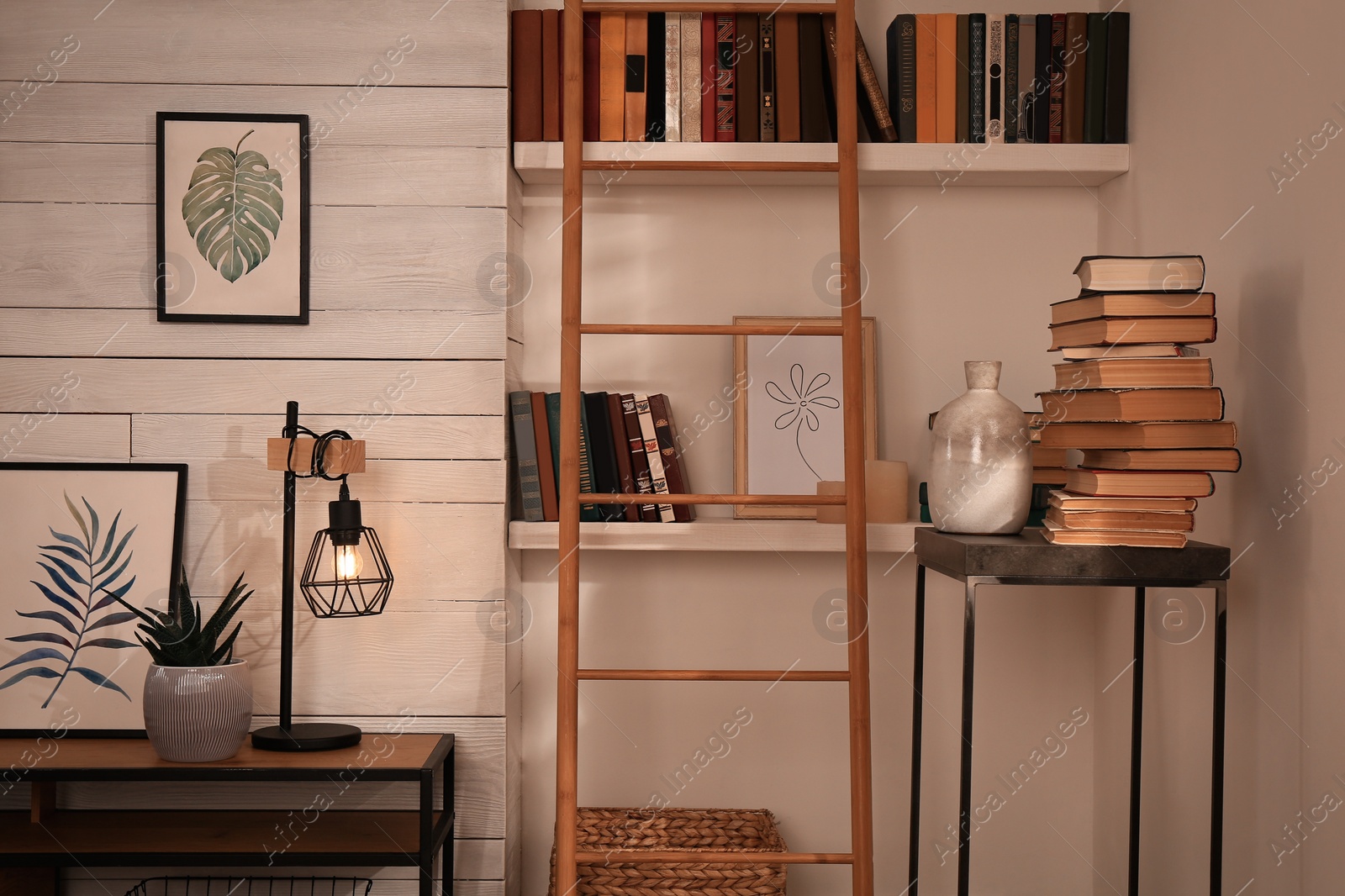 Photo of Home library interior with modern furniture and collection of different books on shelves