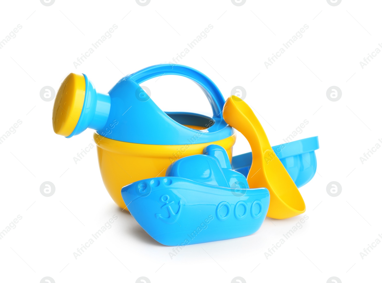 Photo of Set of plastic beach toys on white background