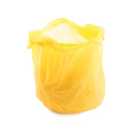 Photo of Yellow plastic garbage bag isolated on white