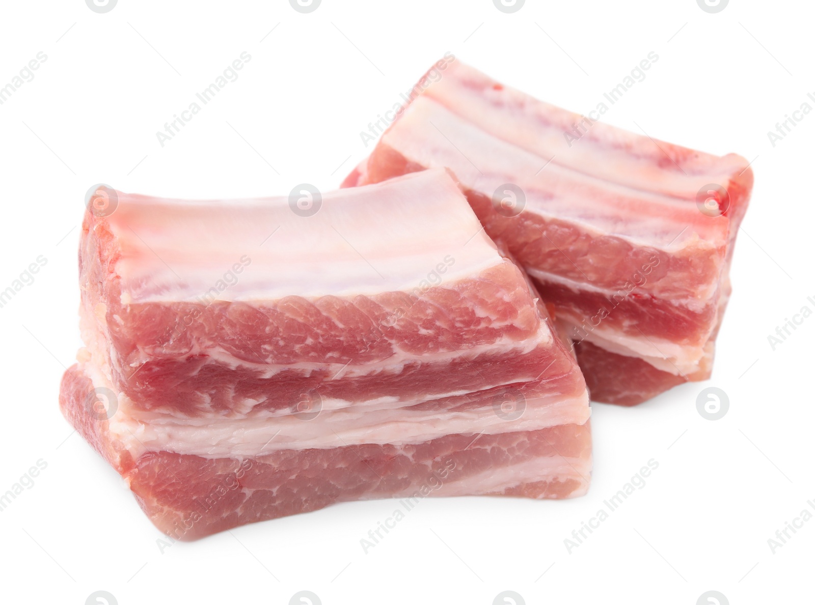 Photo of Cut raw pork ribs isolated on white