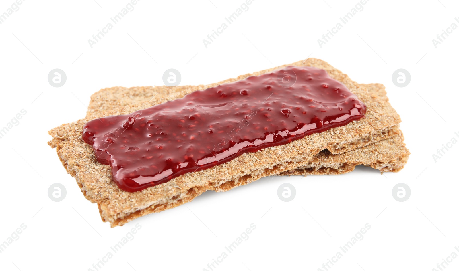 Photo of Fresh rye crispbreads with jam on white background