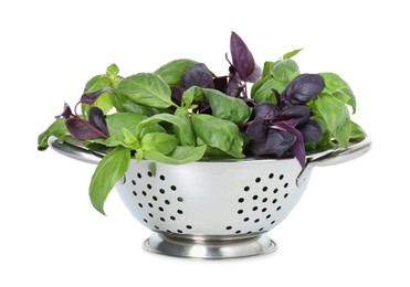 Photo of Metal colander with fresh basil leaves isolated on white