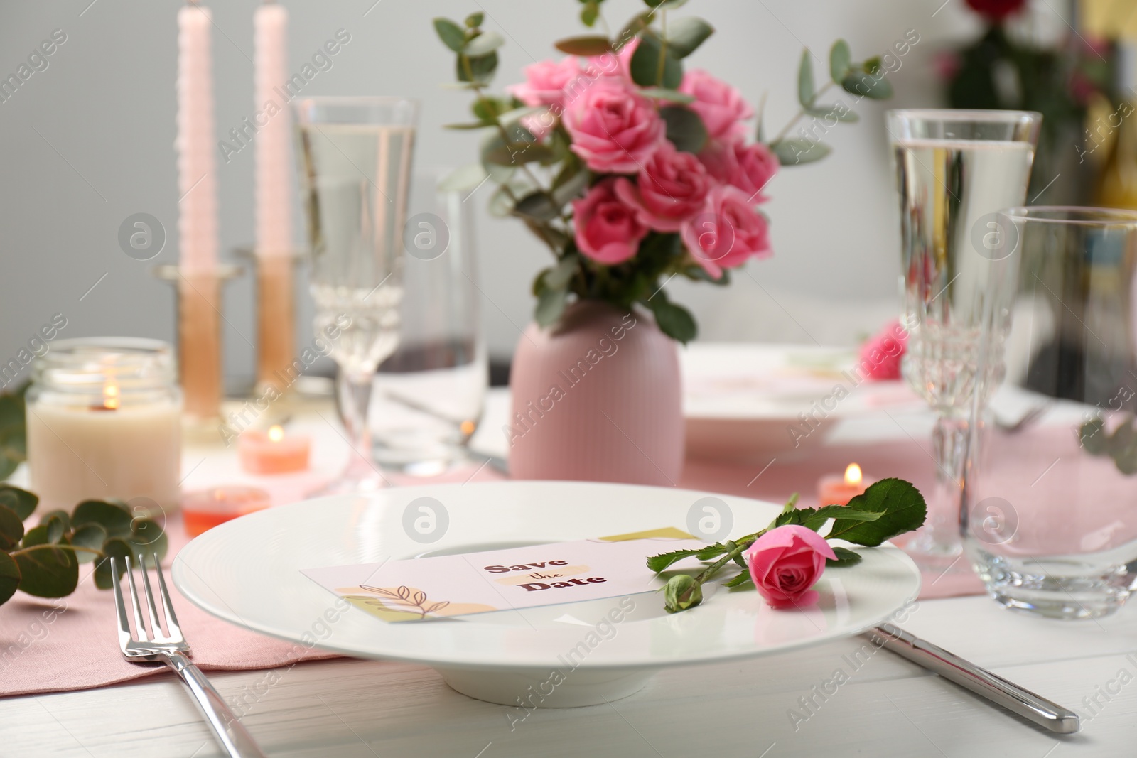 Photo of Romantic table setting with flowers and candles