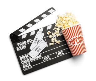 Photo of Clapperboard, popcorn and tickets on white background, top view. Cinema snack