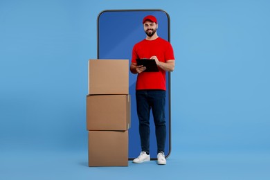 Image of Courier with stack of parcels and clipboard near huge smartphone on light blue background. Delivery service