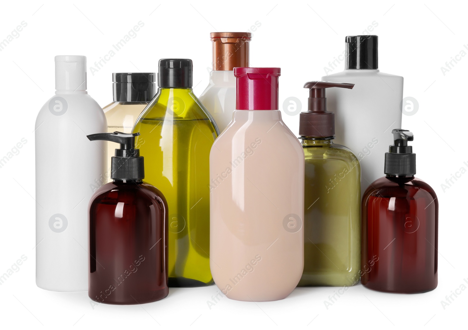 Photo of Different bottles of shampoo on white background