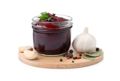 Photo of Pickled beets and spices on white background