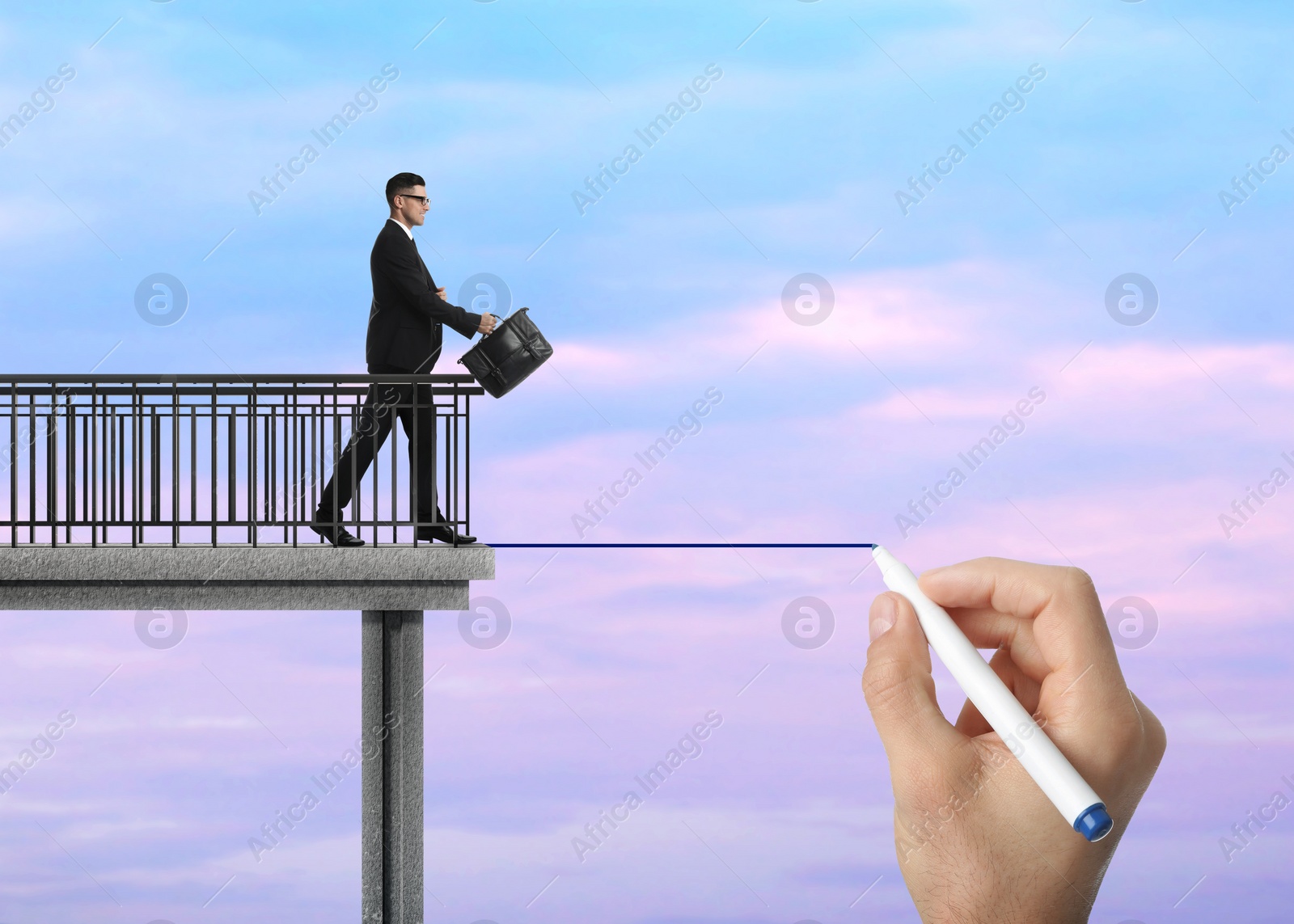 Image of Support or partnership concept. Man drawing bridge to help businessman walk forward