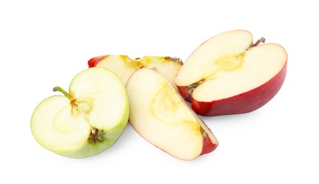 Photo of Pieces of ripe apples isolated on white